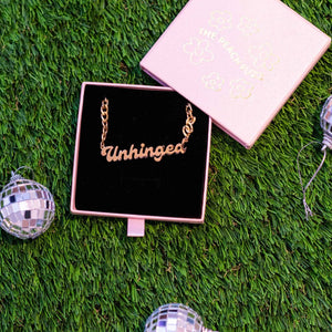 UNHINGED nameplate necklace